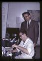 Dean Elmer Stevenson observing "Buchanan" at work in Food Toxicology and Nutrition Laboratory, Corvallis, Oregon, 1967