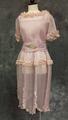 Dress of lilac organdy with pink organdy, ruffle trim