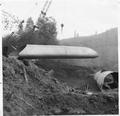 Culvert being lowered by crane