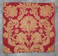 Textile Panel of red and gold wool brocade with a ornate pomegranate at center