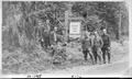 Forest Service personnel posed near sign