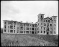 Building on campus of St. Mary's Academy (Marylhurst), Lake Oswego, Or. Lawn in foreground.