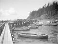 Fishing boats tied to wharf on Columbia River.