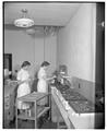 Home Economics students weighing ingredients in Milam Hall, January 1954