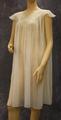 Nightgown of sheer ivory nylon with lace yoke