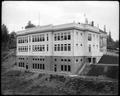 Rear view of Rainier School, built into hillside.