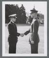 Army and Navy cadet officers shaking hands, circa 1945