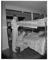 Students posing in the sleeping area of the new men's residence co-op, September 1954