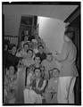 Dick Dagget, pharmacy senior, lines up his Phi Kappa Psi boys for a quick run-through of "Stairway To The Stars," December 1950