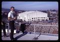 Dennis Hedges on President's box roof, Parker Stadium, Oregon State University, Corvallis, Oregon, circa 1969