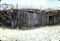 Door on front, end of barn, overexposed