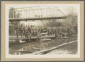 OAC cadets posing on a temporary bridge across the Marys River