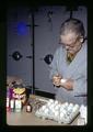 Jesse Parker making hole in egg, Oregon State University, Corvallis, Oregon, circa 1972