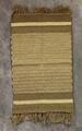 Rug of jute with horizontal stripes of grey, white, and brown