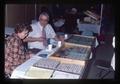 Dick Cowan and Mrs. Cowan at bourse table, Salem Coin Show, Salem, Oregon, 1976