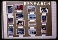 Closeup of research photos in Oregon Agricultural Experiment Station exhibit at Curry County Fair, Gold Beach, Oregon, August 1969