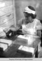 Candy Kitchen, Berea College: young woman wrapping