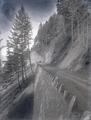 Rock embankment along unpaved highway