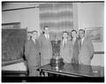 Sigma Chi scholarship trophy presented to Dean Poling by alumni, November 1954