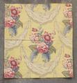 Textile Panel of pale yellow cotton with print of large flowers with leaves set in between a string of beads and draped cloth with fringe