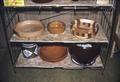 Some bowls on shelf in living room