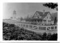 Lighthouse & tower, home of keeper & staff looking from south to north.  Note architectural similarity to Heceta Light station.