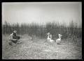 W. L. Finley photographing pelicans