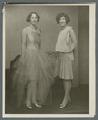 Two women in dance or formal dresses, circa 1925