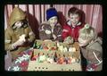 Kids playing with dyed chicks, Oregon State University, Corvallis, Oregon, December 1972