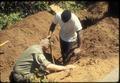 Two men digging at CPVC