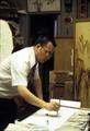 Wing K. Leong doing sumi painting in his studio