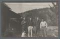 Arbuthnot, his dog, and three men at a farm, circa 1910