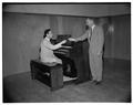 Organist Tom Roberts and an unidentified individual, October 22, 1953