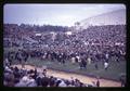 Fans rush the field at the conclusion of a football game, Parker Stadium, Oregon State University, Corvallis, Oregon, circa 1965