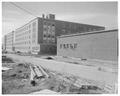 New men's dorm and cafeteria in final stages of completion, August 1957