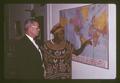 Dean Wilbur Cooney and Cameroon student looking at map, circa 1965