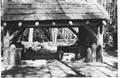 Side view of completed rustic stone shelter.  See Series 02-093 through 02-098