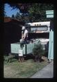Gene Lear testing boat motor in trailer, Oregon, September 1987