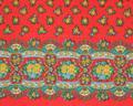 Textile panel of bright red cotton with pattern of yellow roses and blue flowers with green stems