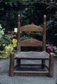 Small rawhide chair, with tanned seat not woven, once a rocker then rocker cut off, top finials worn because kids in the family learned to walk by turning the chair upside down and pushing it, 20 x 10 x 10 inch, 1870