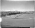 Tennis courts with Marys Peak in background, February 1948