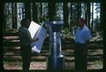 George McNew and colleague with bark beetle trap, 1963