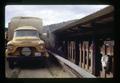 Truck unloading feed in trough, Wheeler County, Oregon, circa 1973