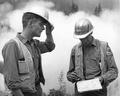 Two Siuslaw National Forest foresters discussing tactics at  Buck Mountain fire, Detroit Ranger District