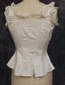 Camisole of white cotton with square neckline trimmed in lace and ribbon