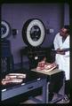 Dr. Walter Kennick weighing steaks in Meat Lab, Oregon State University, Corvallis, Oregon, circa 1965