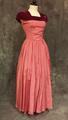 Evening gown of pink rayon faille with yoke of violet silk velvet