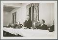 Group at banquet table, circa 1935