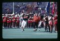 Coach Dee Andros leading team onto field, Parker Stadium, Corvallis, Oregon, circa 1972