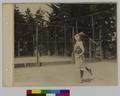 Woman playing tennis (recto)